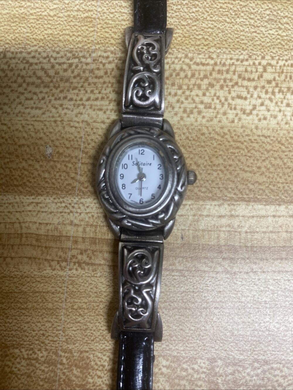 SOLITAIRE WOMEN’S Quartz Watch Silver Tone JAPAN MOV’T Black Leather Band